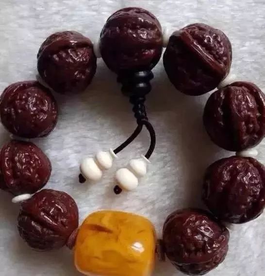 星月菩提包浆后开片_金刚菩提包浆方法_南红盘玩后有什么变化